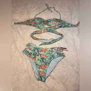 Victoria Secret floral print swimsuit with cute cut outs and tie around top